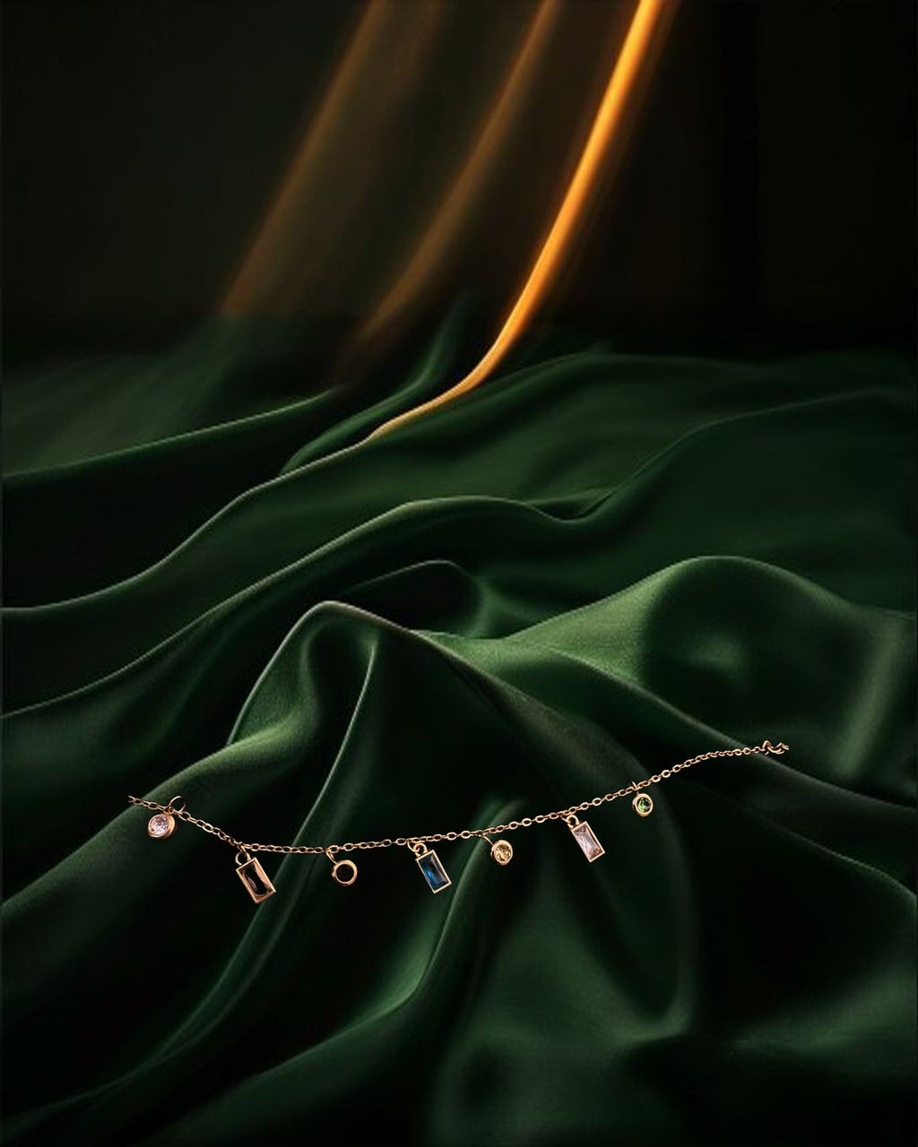 Drop 01 campaign artwork — digital scene composed around our own product photograph: Crystal Charm Necklace on backlit green silk