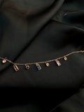 Crystal Charm Necklace on dark green silk