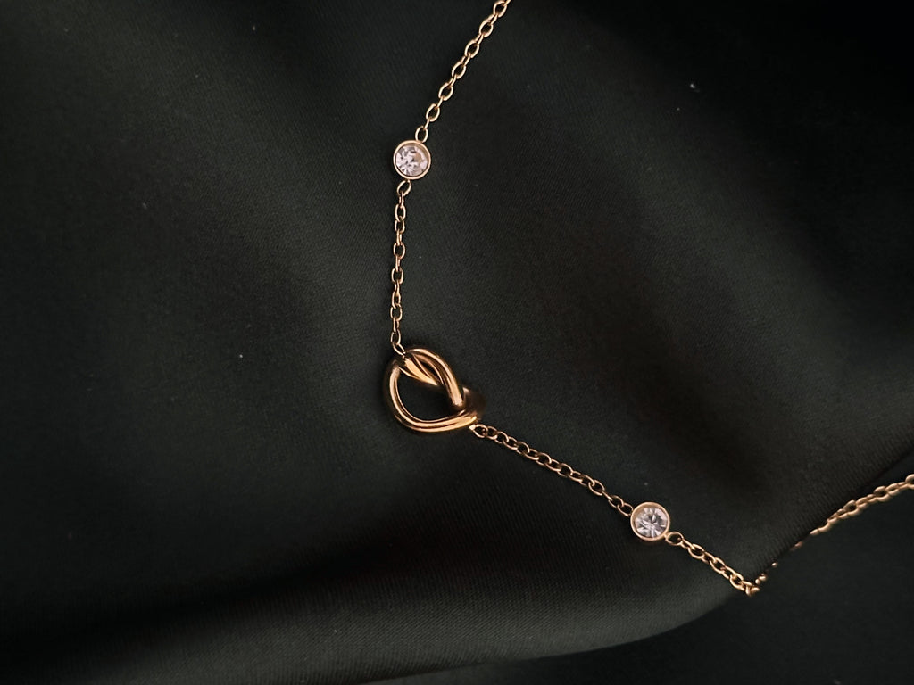 Infinite Love Necklace knot detail on green silk