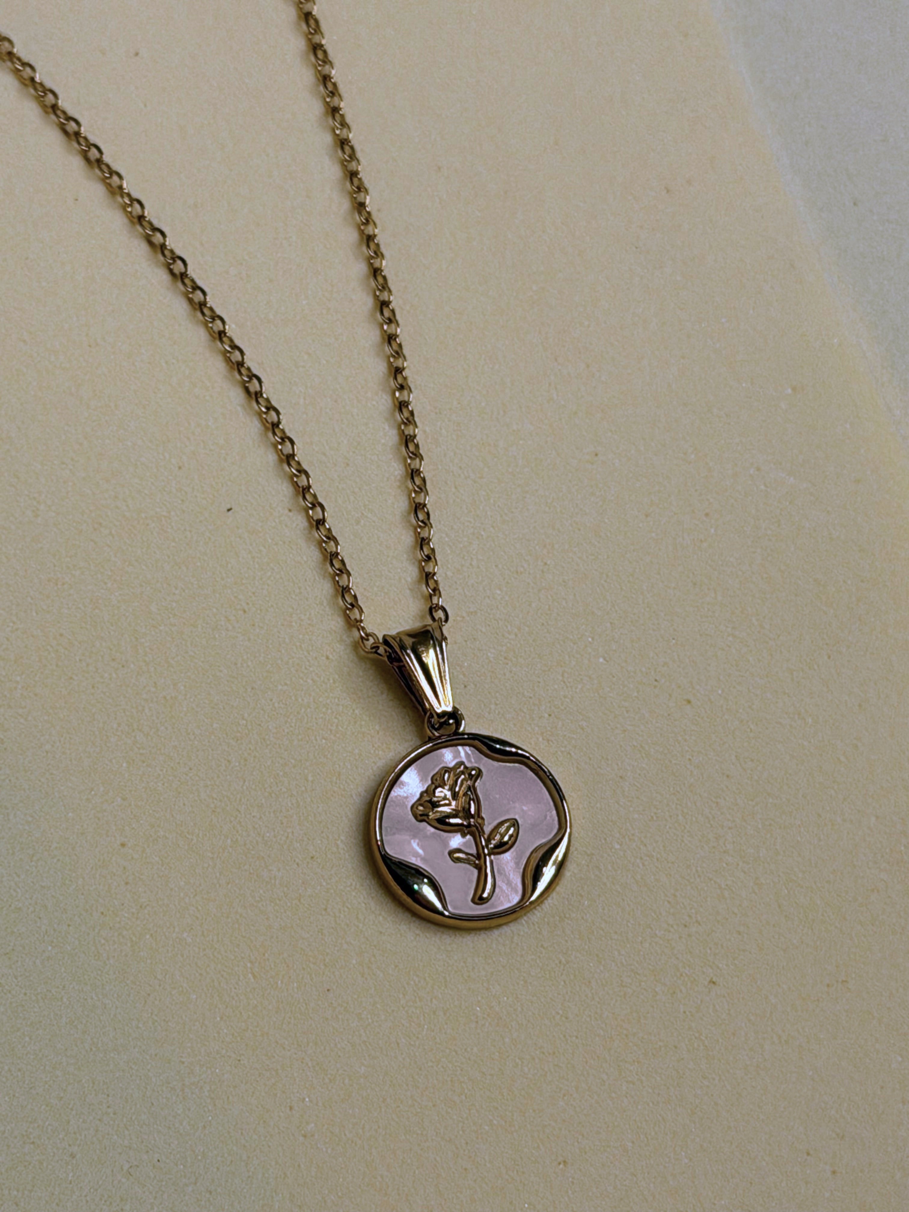 Pearl Coin Necklace laid flat, showing the full chain and clasp
