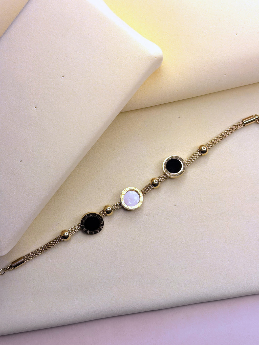 Roman Black & White Bracelet showing the Roman numeral detail and adjustable chain