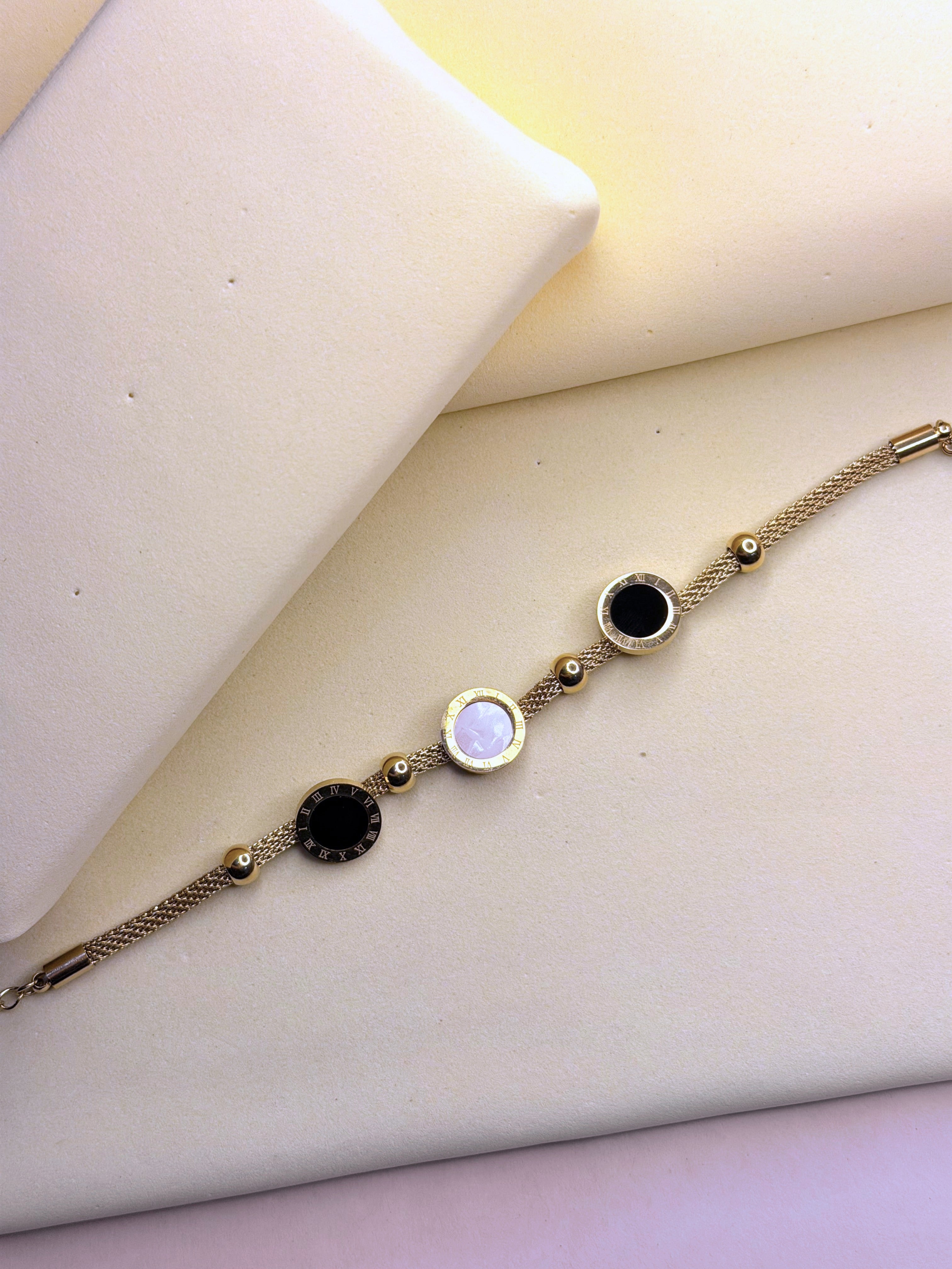 Roman Black & White Bracelet showing the Roman numeral detail and adjustable chain